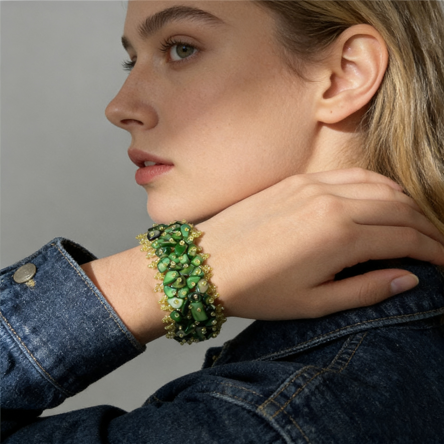 Abalone shell chip statement bracelet worn on wrist