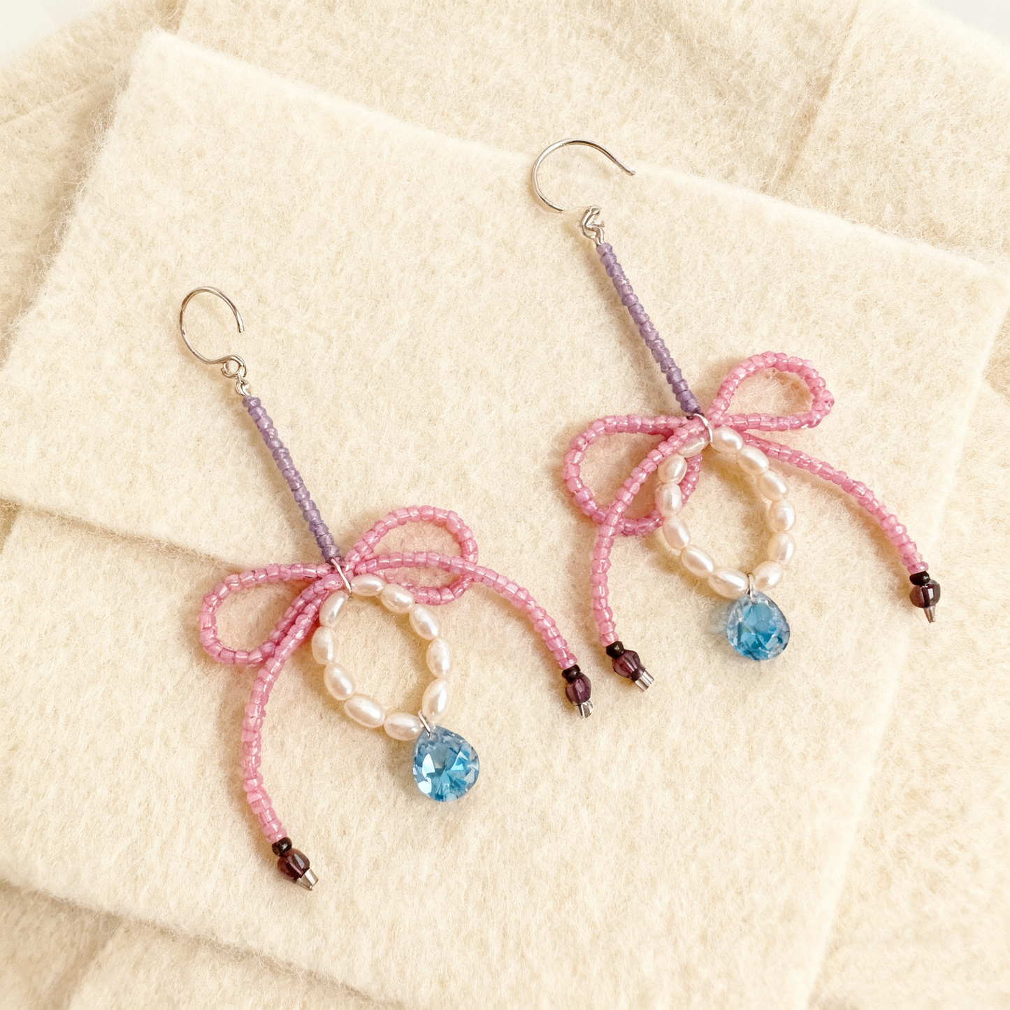 Romantic pink beaded earrings with dangling crystal
