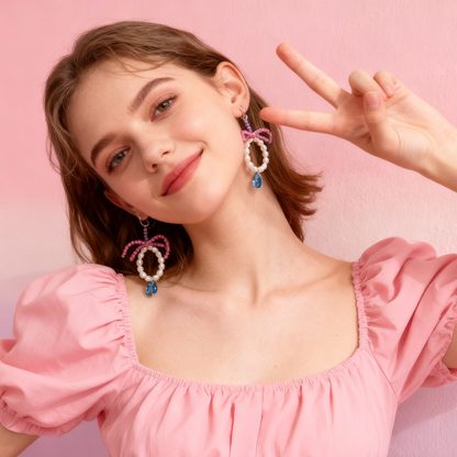 Handmade beaded bow earrings with pearl accents