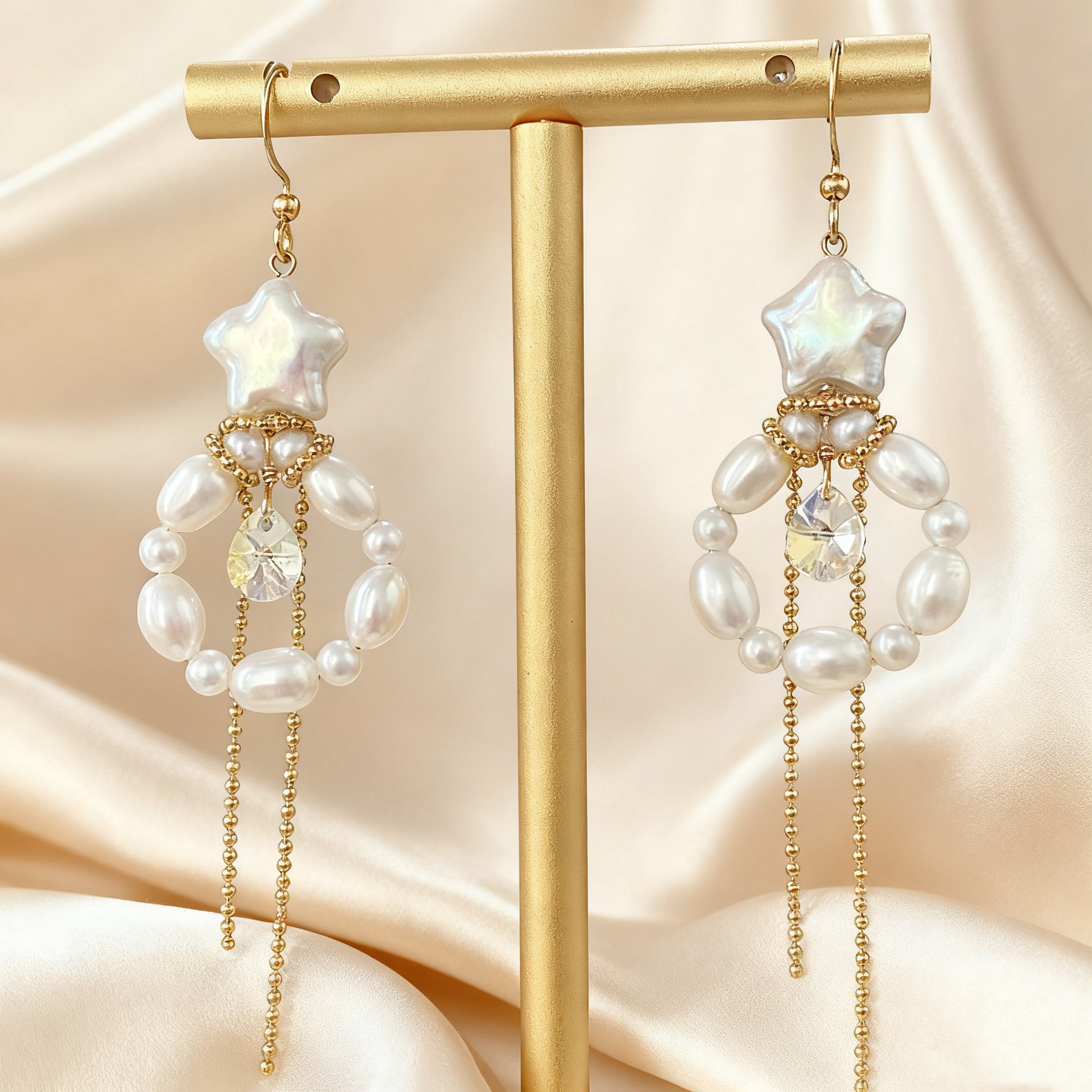Elegant baroque pearl earrings displayed on stand