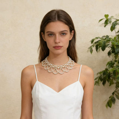 Close-up of scalloped faux pearl choker with layered beadwork