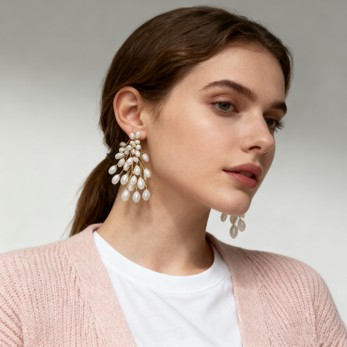 Elegant cascading pearl earrings with organic movement