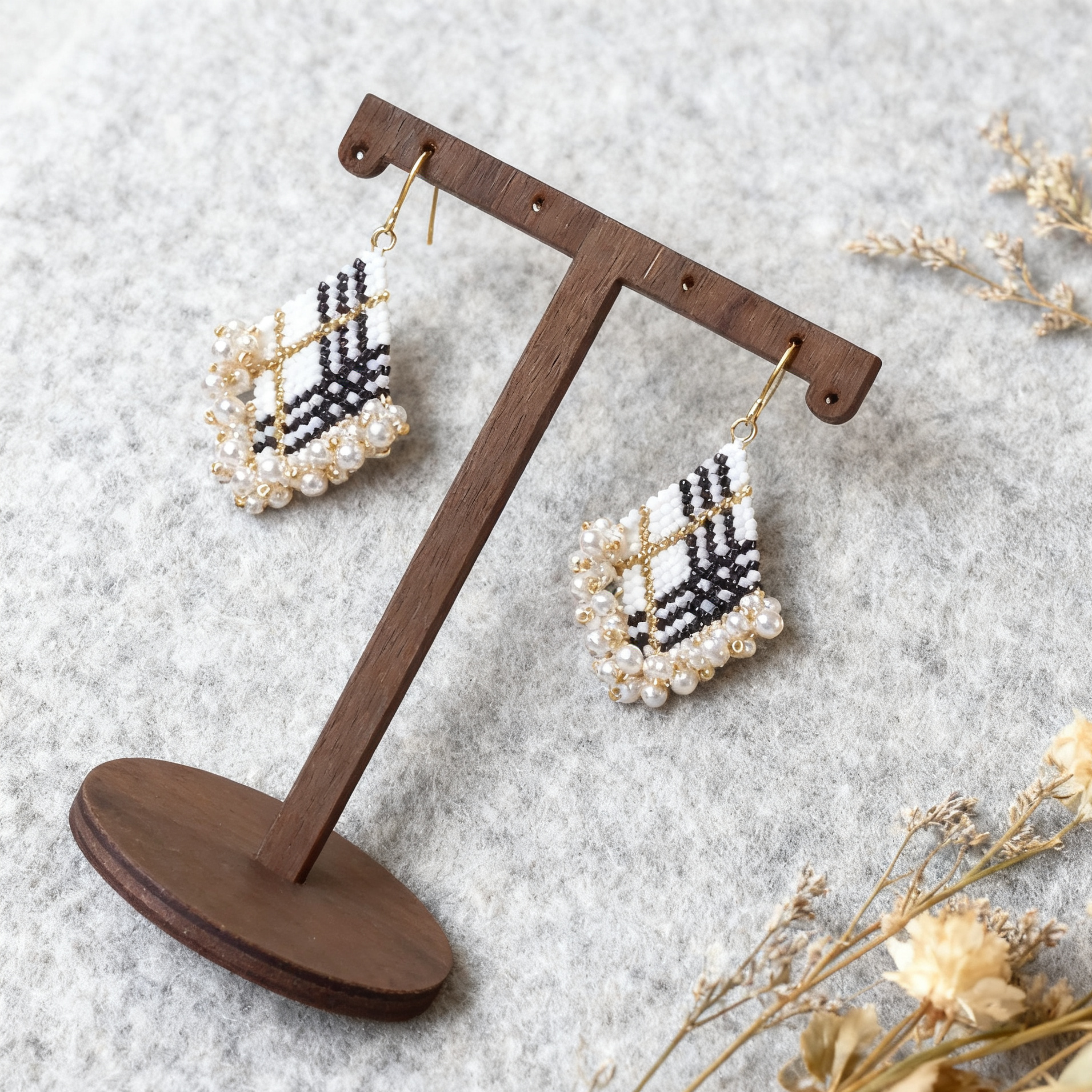 Geometric handmade beaded earrings with structured design