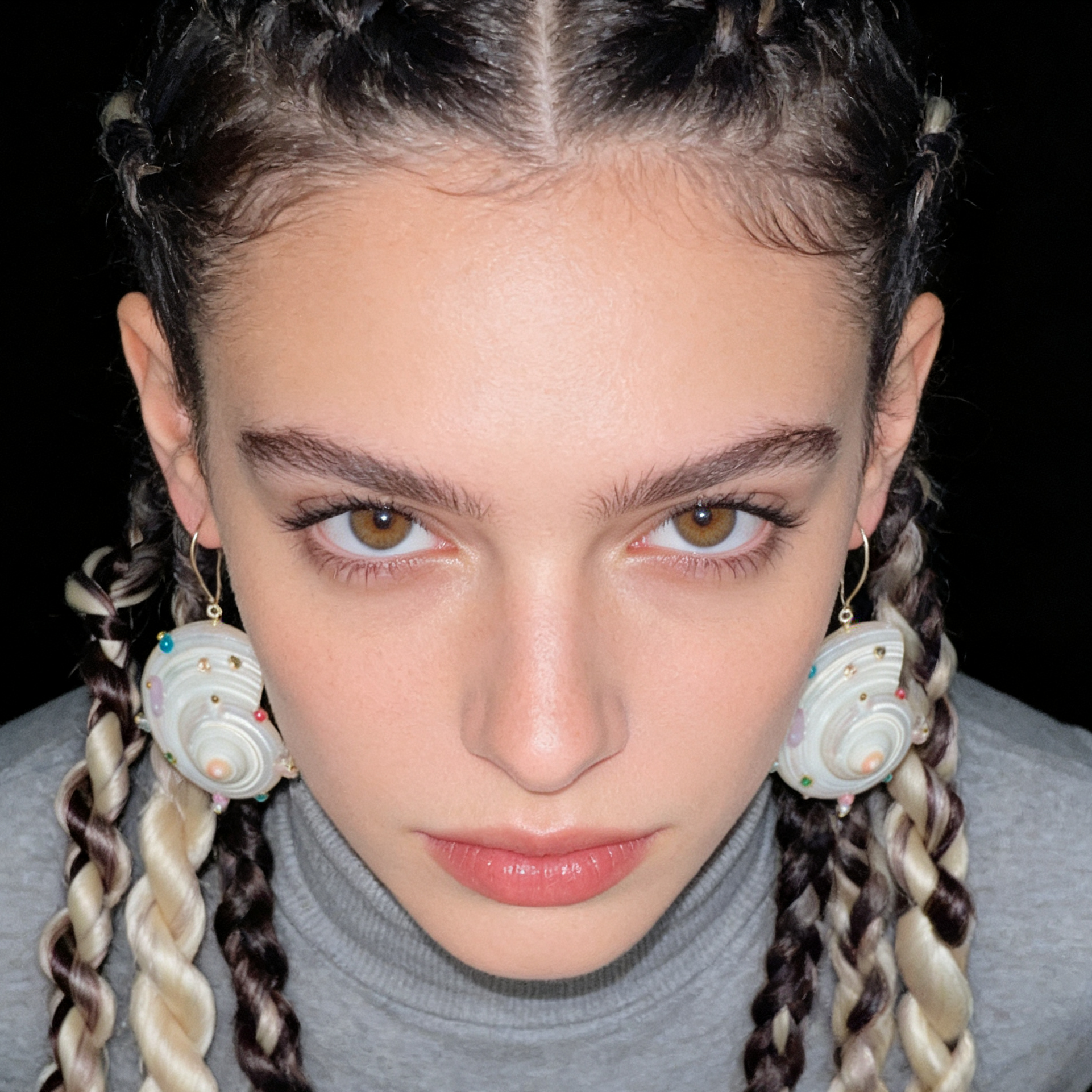 Statement earrings made from natural shell, freshwater pearls, and Swarovski® crystals