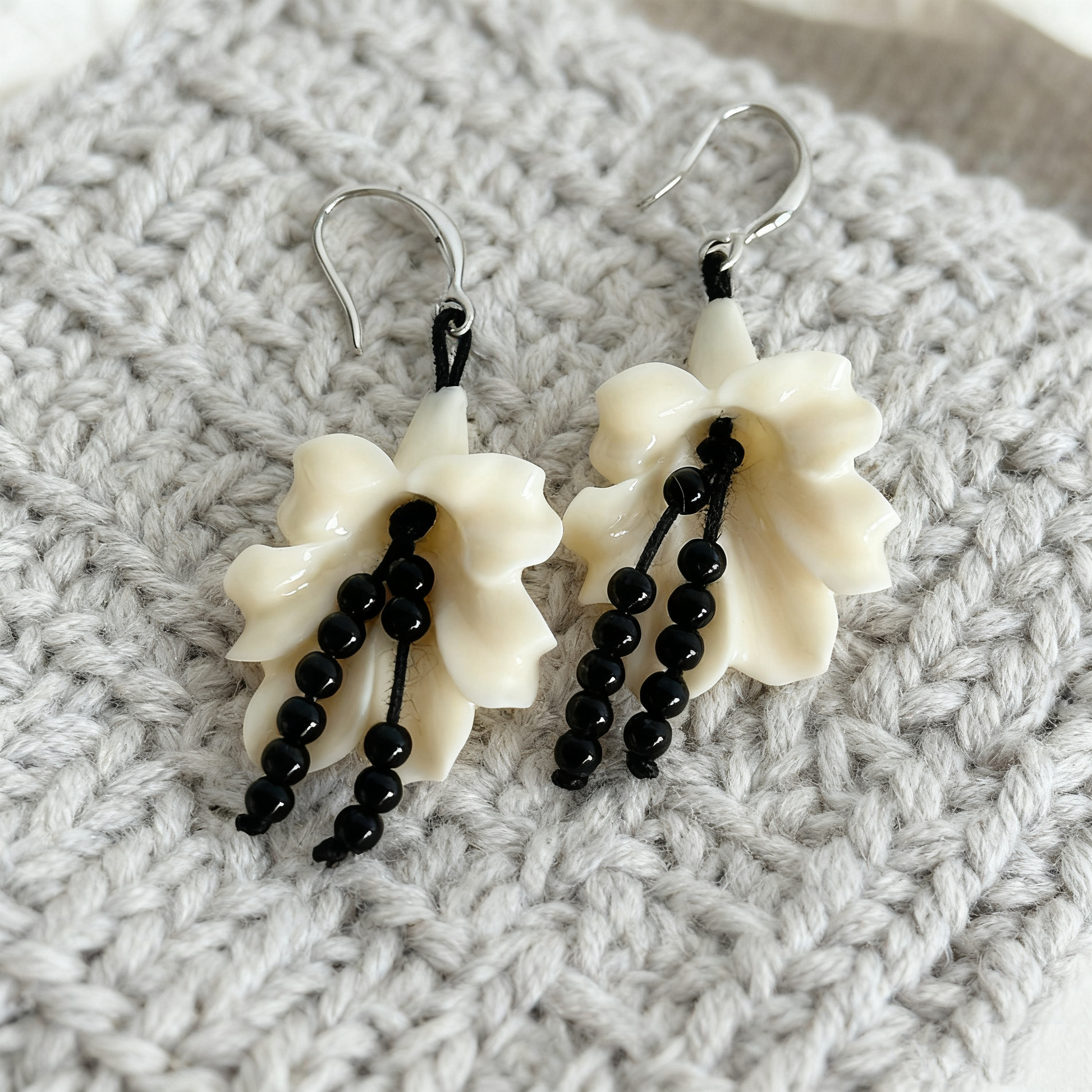 Sculptural shell flower earrings with elegant drop design