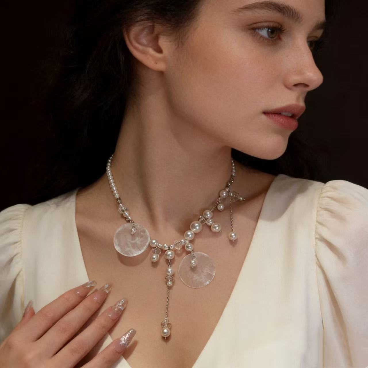 Mabe pearl and mother of pearl drop necklace worn on neck