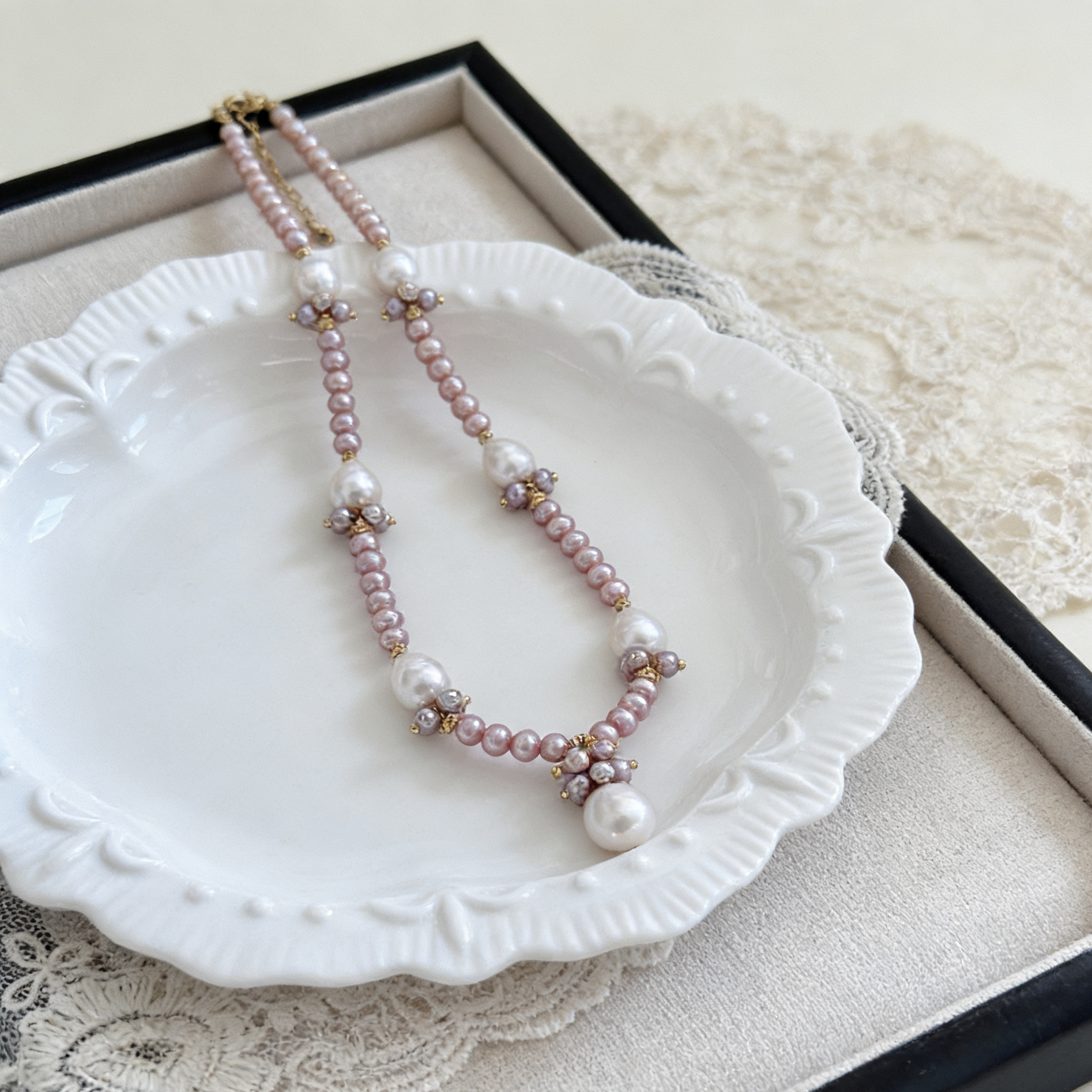 Soft pink pearl necklace with elegant drop pendant