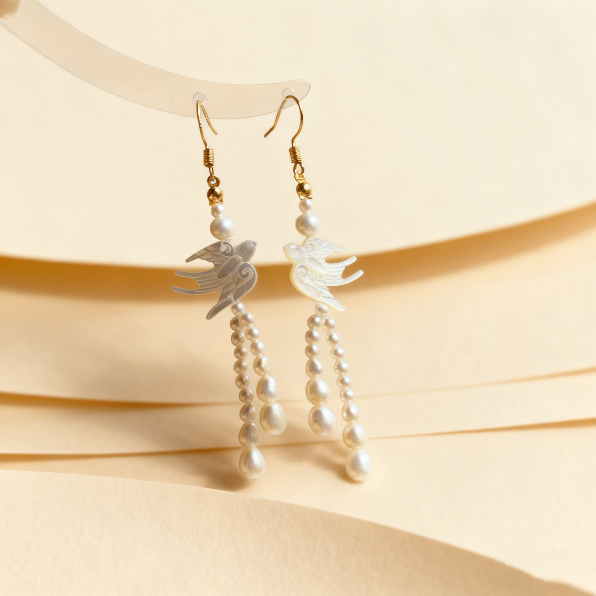 Cascading pearl drop detail on lightweight earrings