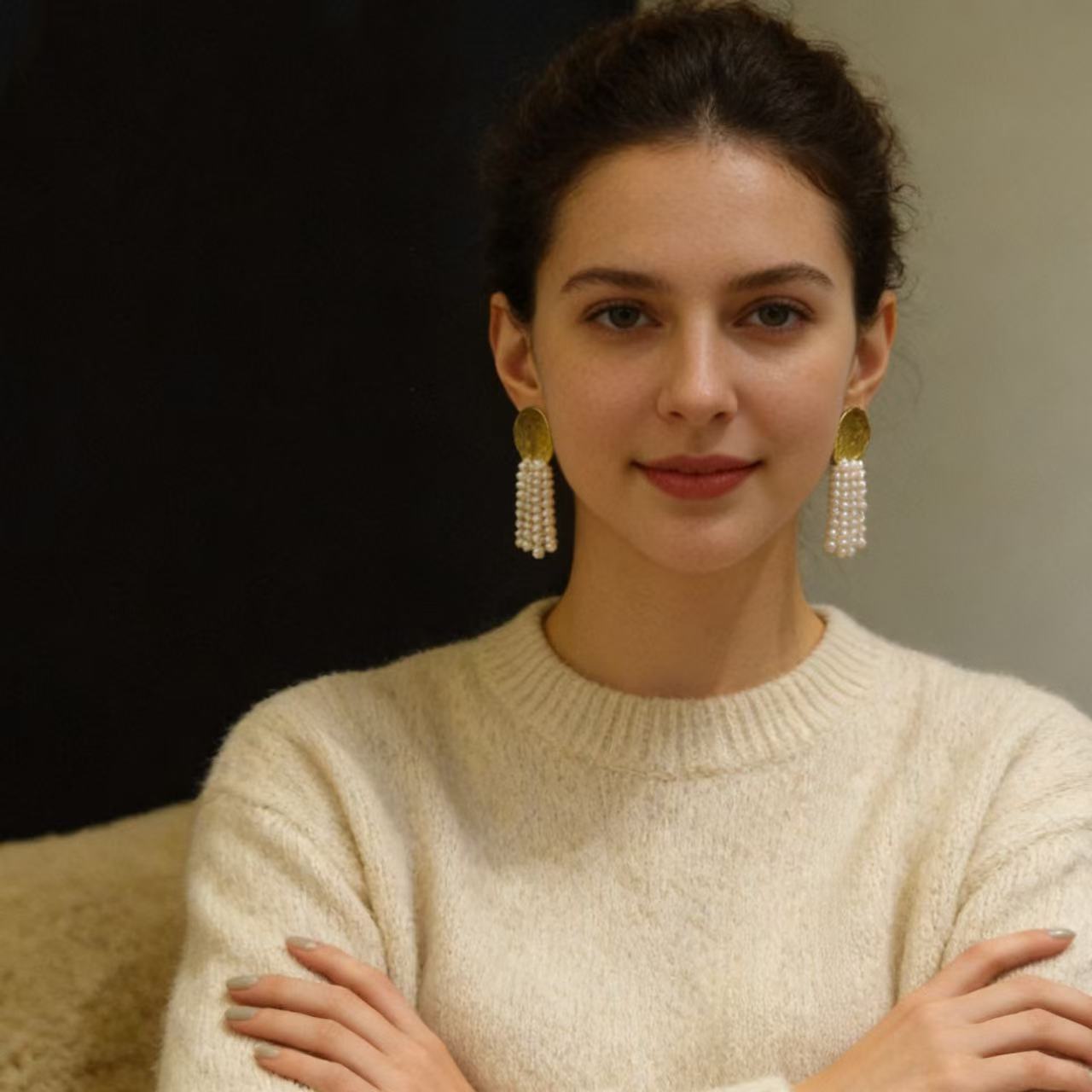 Natural pearl drop strands on statement earrings