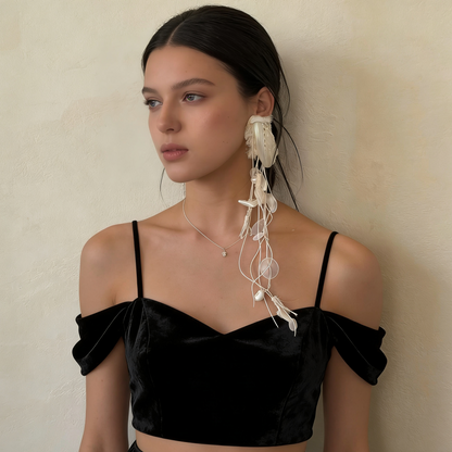 Lightweight natural shell earring designed for artistic everyday wear