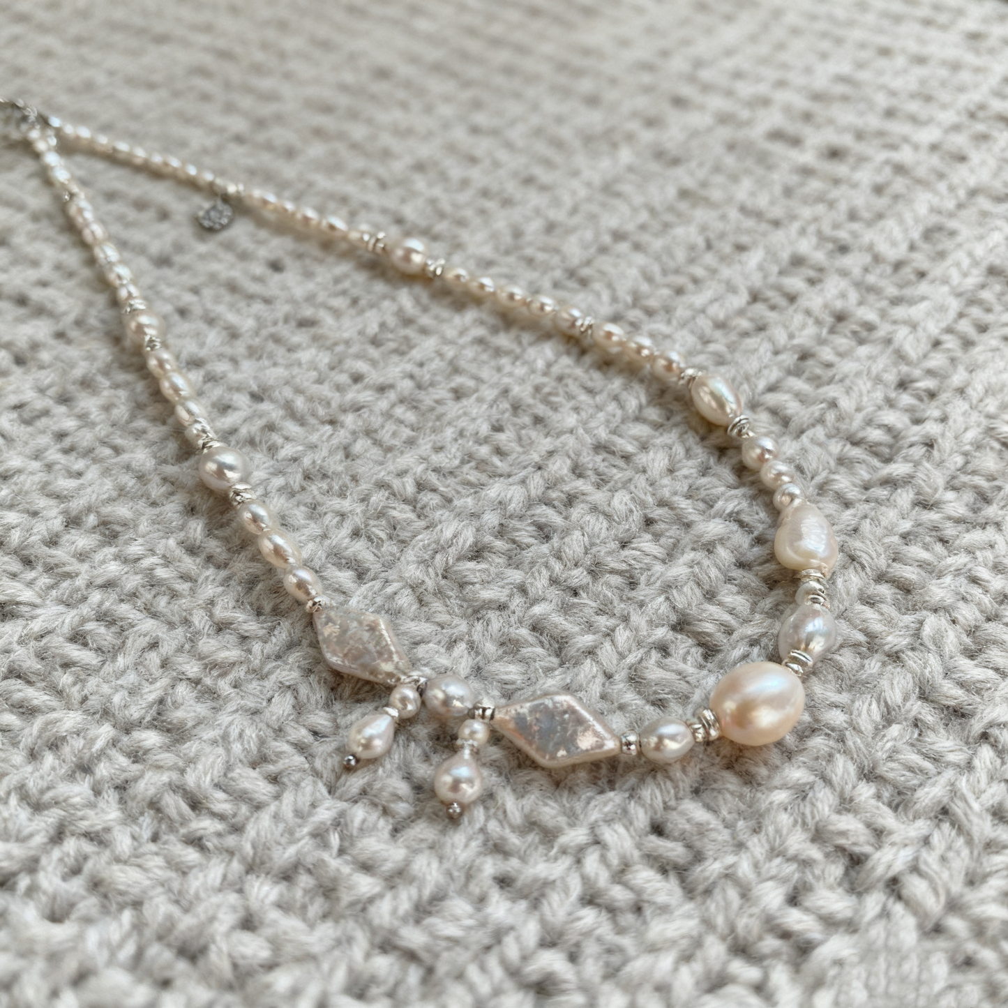 Asymmetric Pearl Necklace with Iridescent Shell Details