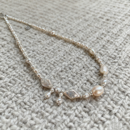 Asymmetric Pearl Necklace with Iridescent Shell Details