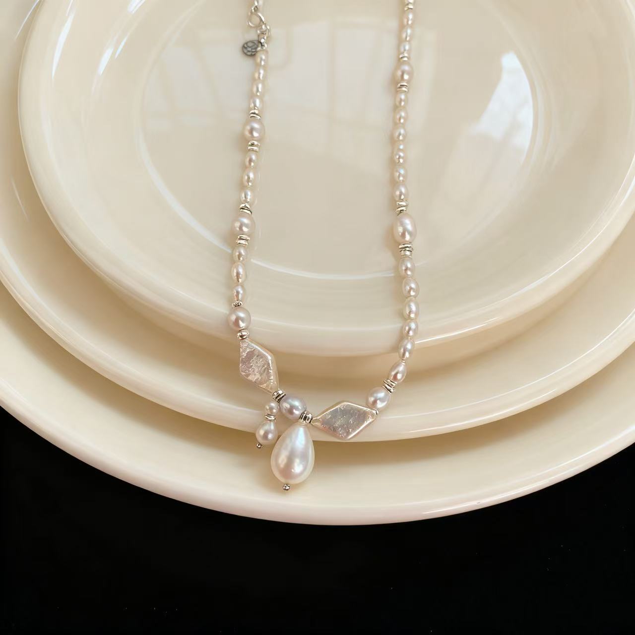 [material / texture] details on delicate necklace