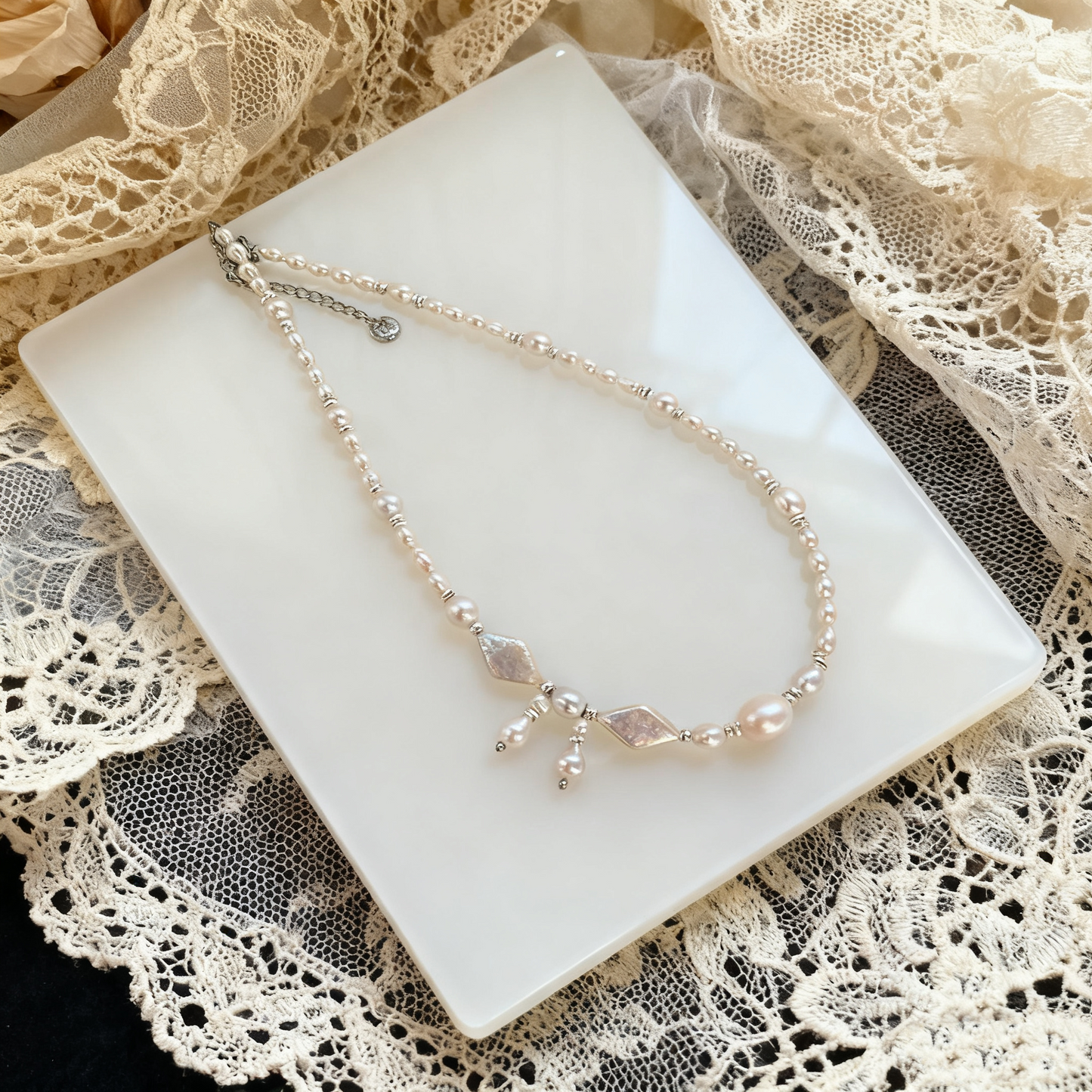Asymmetric Pearl Necklace with Iridescent Shell Details