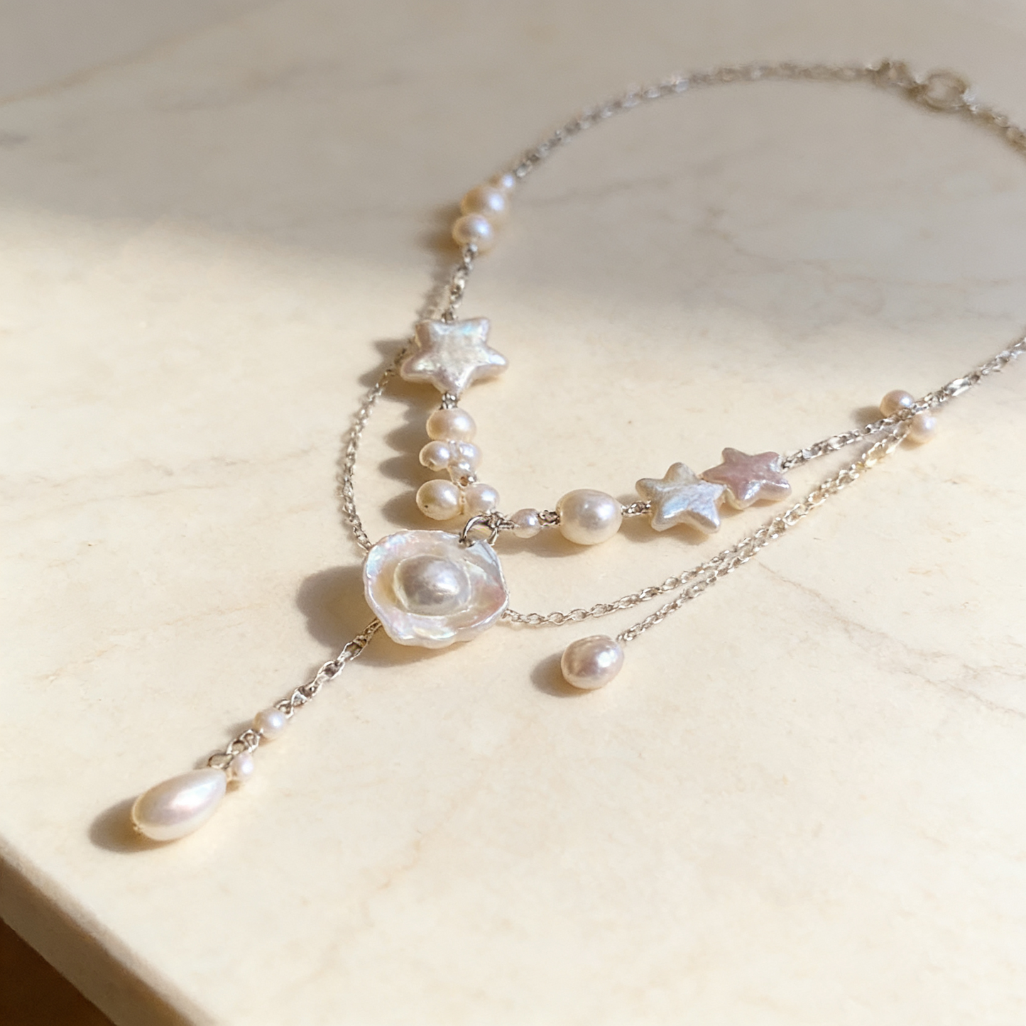 Layered Pearl Necklace with Star Details – Soft White