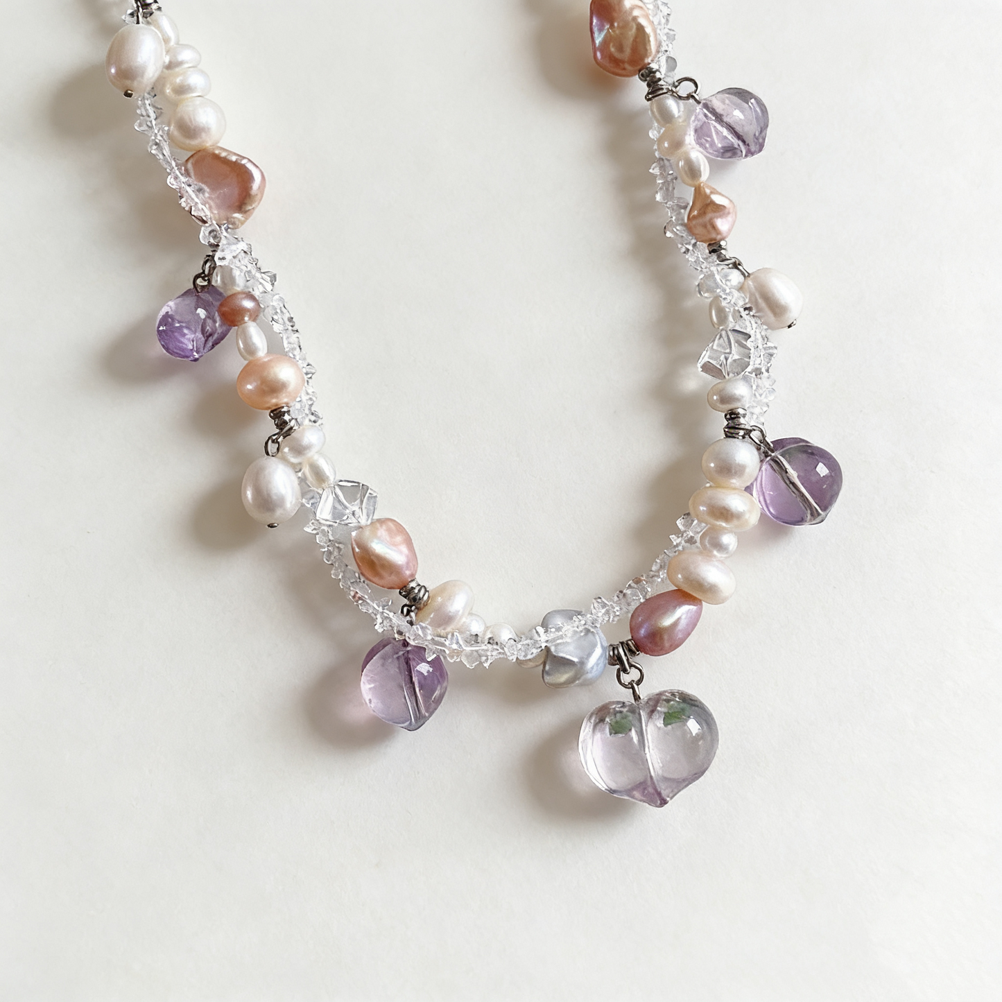 Natural pearl and crystal necklace close up detail