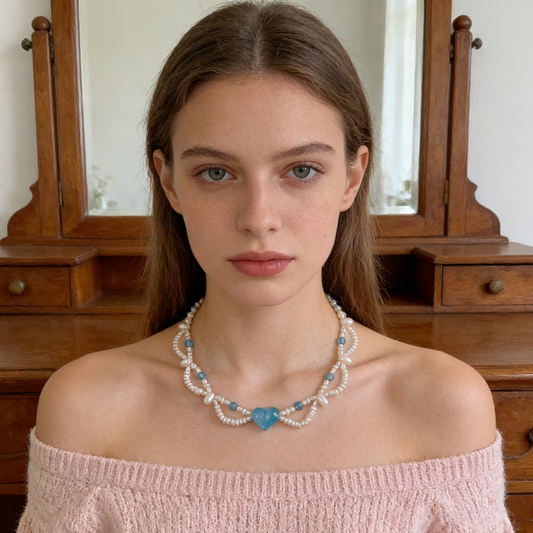 Handmade crystal and natural pearl charm necklace flat lay