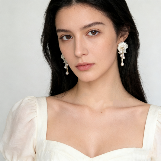 Shell mabe pearl tassel earrings worn on ear