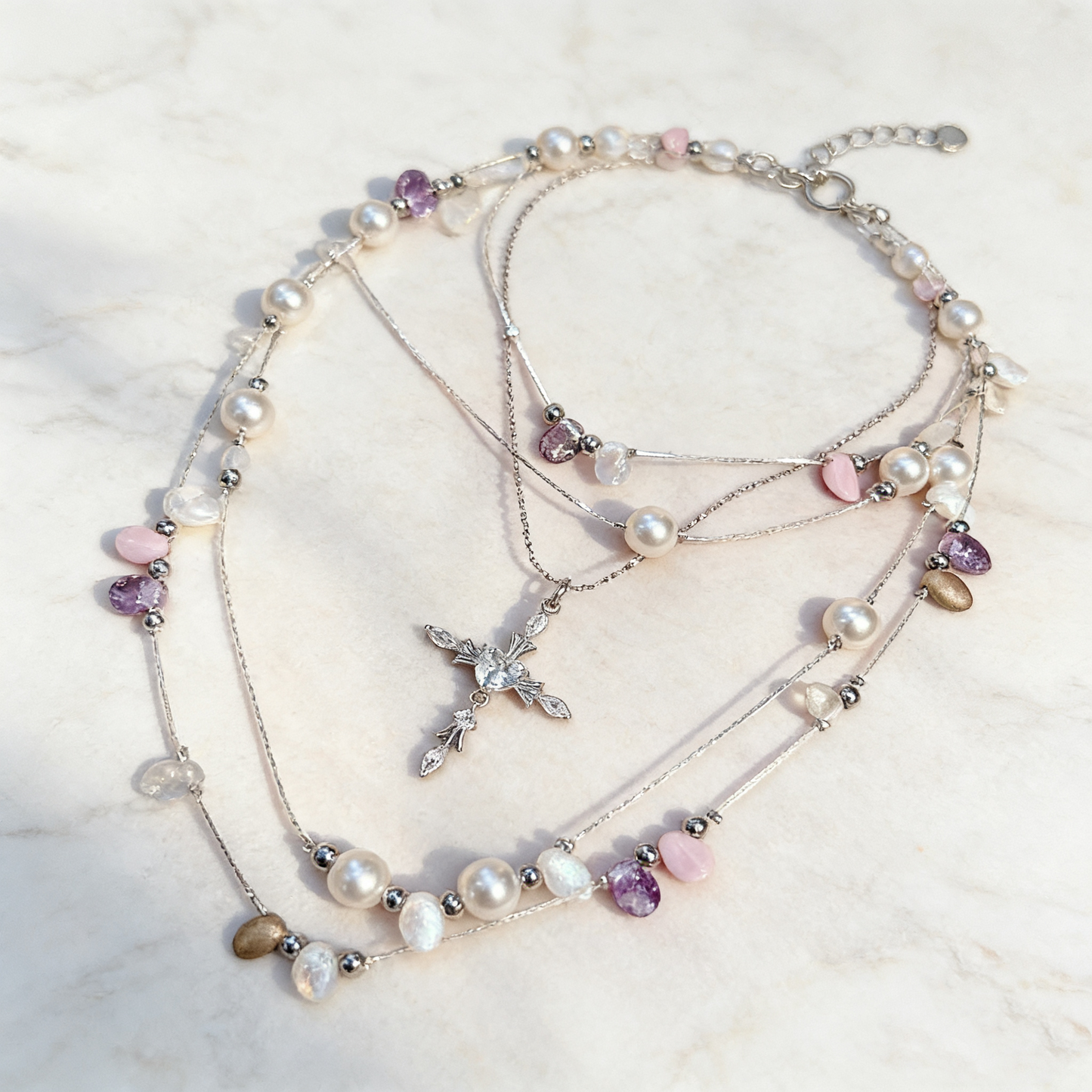 Romantic layered pearl necklace in soft pink tones